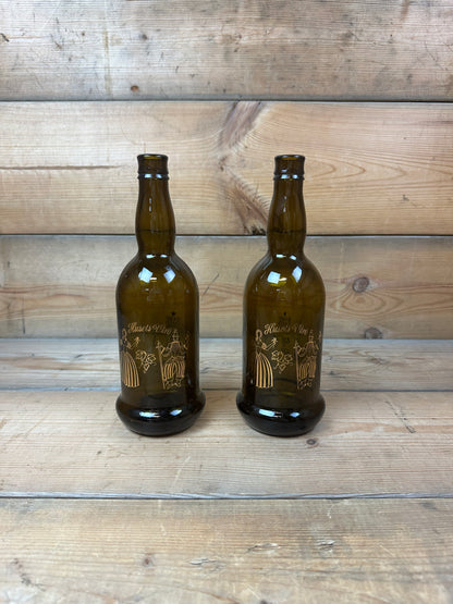 2 stk. Holmegaard flasker "Husets vin "Glas